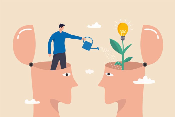 digital illustration of two human heads and a man is coming out of one to water the other - growth mindset